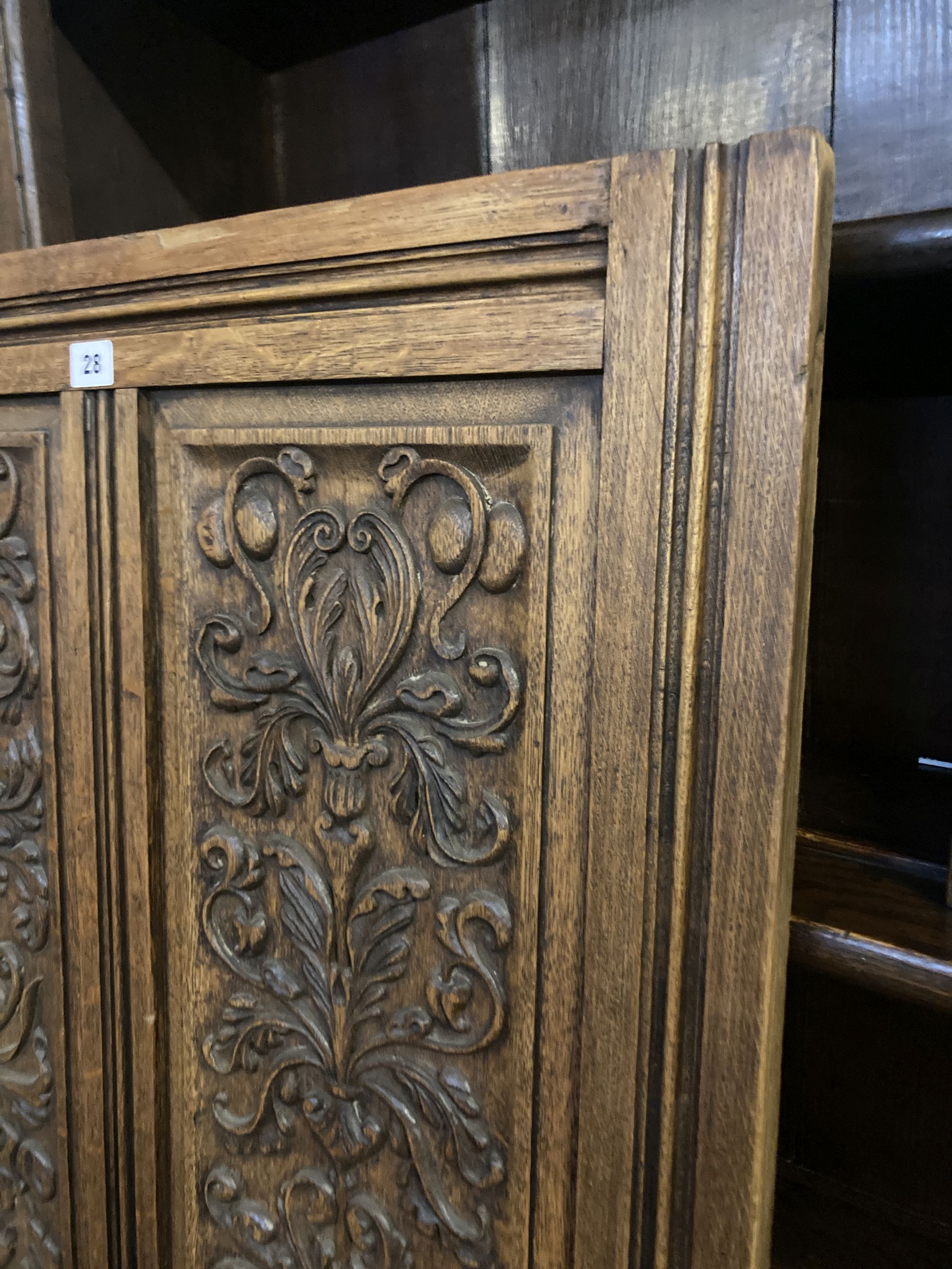 A late 19th century carved oak panel, width 72cm height 84cm
